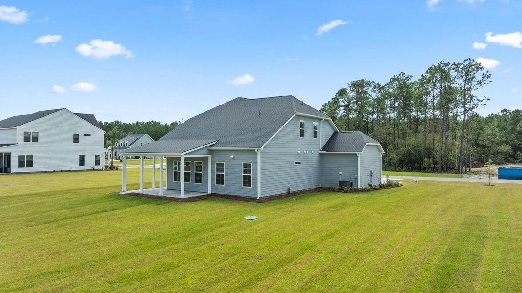Exterior details and patio area of a home in Pamlico Terrace, Awendaw (Image 2).