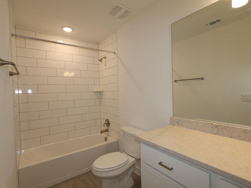 Furnished interior view inside a new home in Edgewood, Leander (Image 10). Furnished interior view inside a new home in Edgewood, Leander (Image 10).