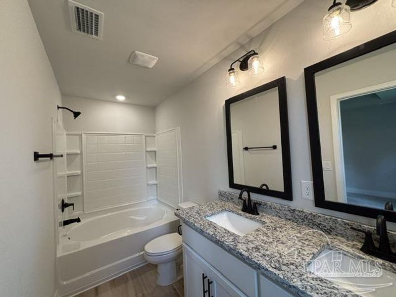 Furnished interior view inside a new home in Turtle Creek, Cantonment (Image 5).