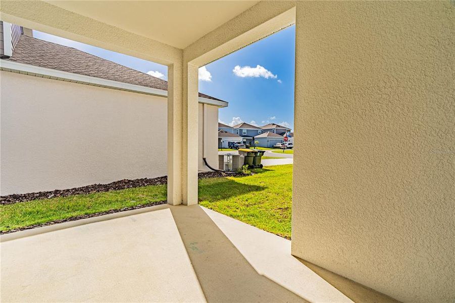 Exterior details and patio area of a home in Wellness Ridge, Clermont (Image 4).