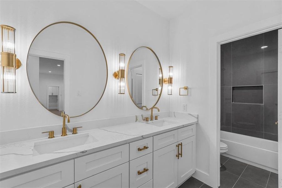 Bathroom with double vanity and tile patterned floors Bathroom with double vanity and tile patterned floors