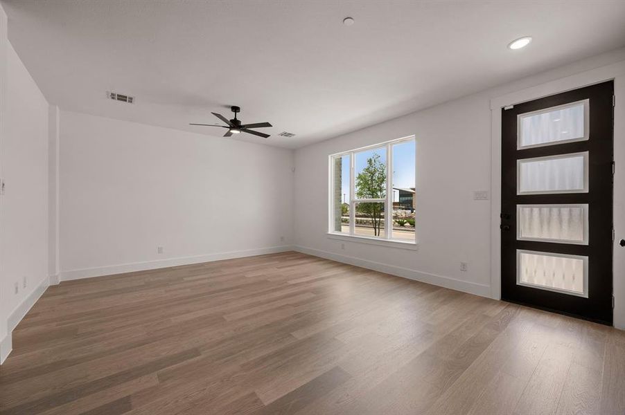 This spacious, light filled family room is the perfect place to host friends and family!