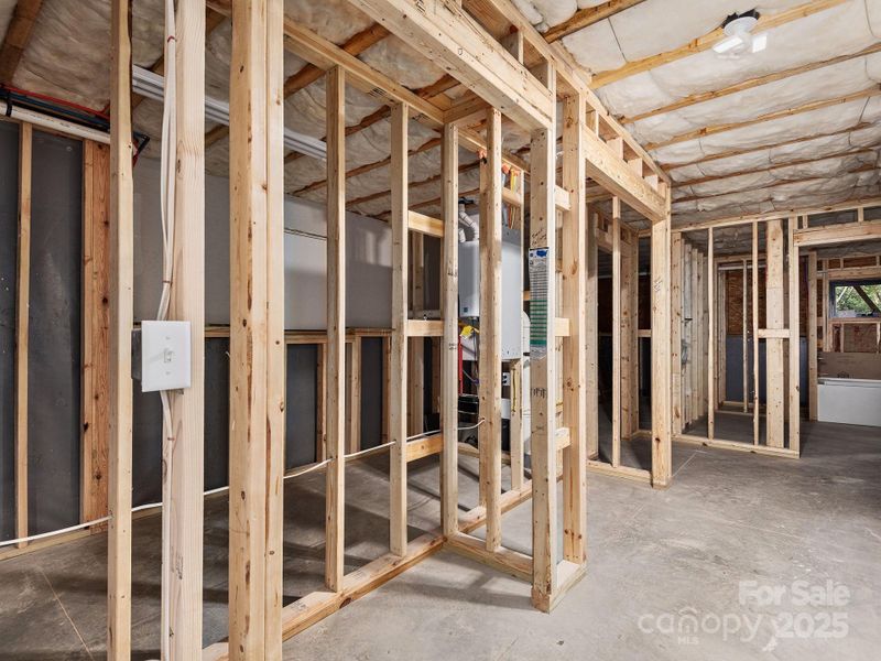 Full basement framed and plumbed for easy finishing!