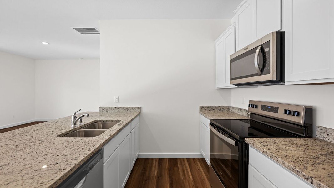 Representative furnished interior of a home built from the Southport by D.R. Horton in Cambridge Cove, Chickamauga (Image 4).