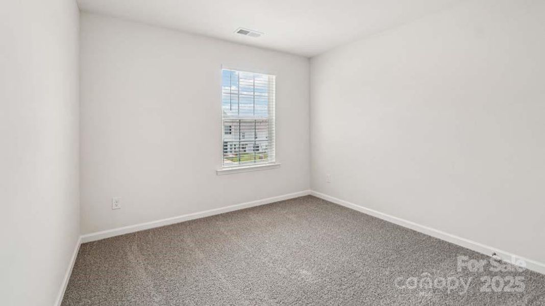 Spacious, unfurnished interior of a new home in Mallard Creek Townhomes, Charlotte (Image 23). Spacious, unfurnished interior of a new home in Mallard Creek Townhomes, Charlotte (Image 23).