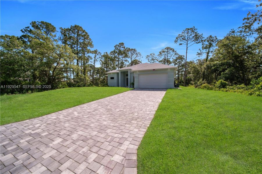 Exterior details and patio area of a home in , Lehigh Acres (Image 29). Exterior details and patio area of a home in , Lehigh Acres (Image 29).