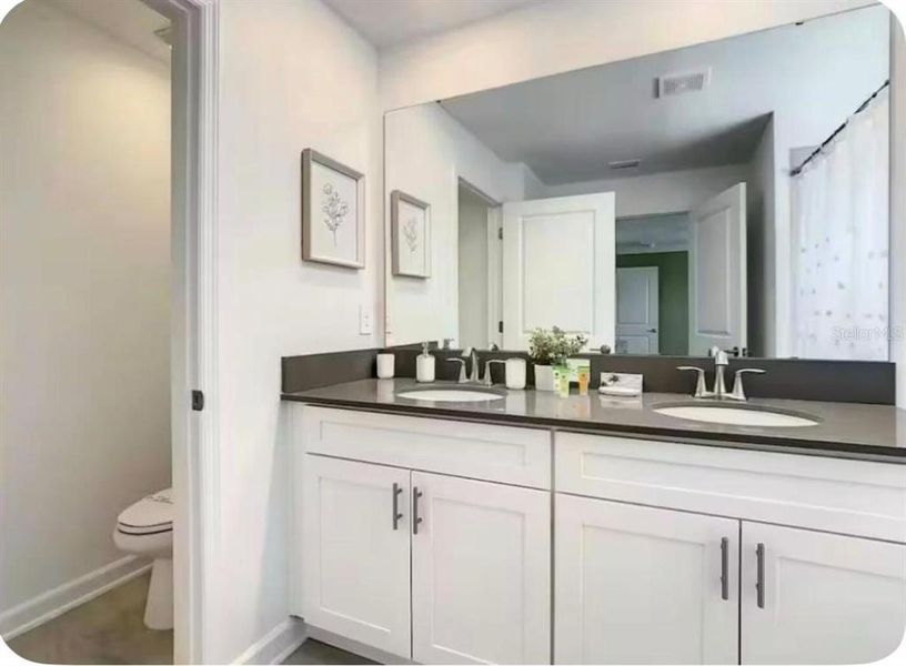 Furnished interior view inside a new home in Storey Lake: Vacation Townhomes, Kissimmee (Image 14). Furnished interior view inside a new home in Storey Lake: Vacation Townhomes, Kissimmee (Image 14).