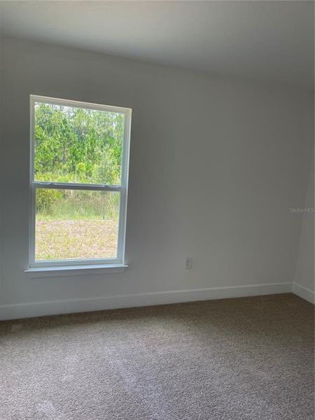 Spacious, unfurnished interior of a new home in Harmony Central, St. Cloud (Image 15).