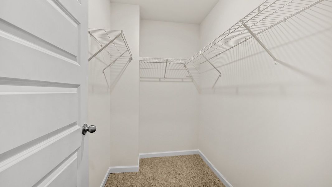 Representative unfurnished interior of a home built from the Salisbury by D.R. Horton in Inverness at Sugarloaf, Lawrenceville (Image 27).