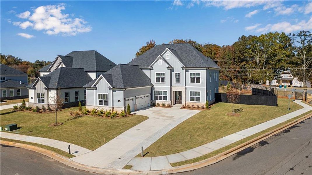 Exterior details and patio area of a home in The Retreat at Caney Creek, Alpharetta (Image 32).