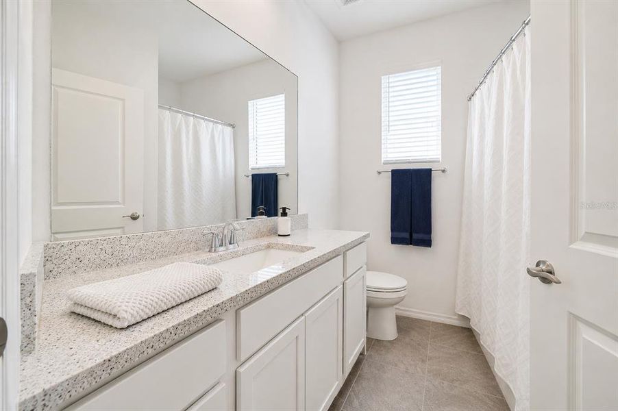 Furnished interior view inside a new home in Towns at Woodsdale Villas, Wesley Chapel (Image 10).