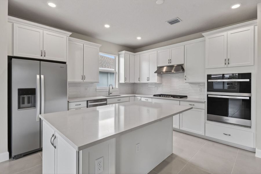 Furnished interior view inside a new home in Del Webb Tradition, Port St. Lucie (Image 5).