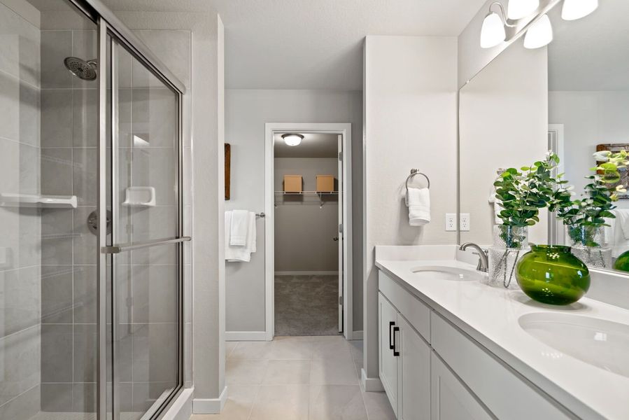 Representative furnished interior of a home built from the The Bellhaven by Challenger Homes in Sky Ranch - Highland Collection, Watkins (Image 23).