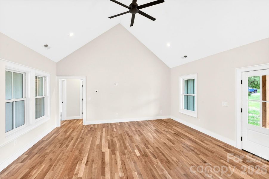 Soaring vaulted ceilings in living room