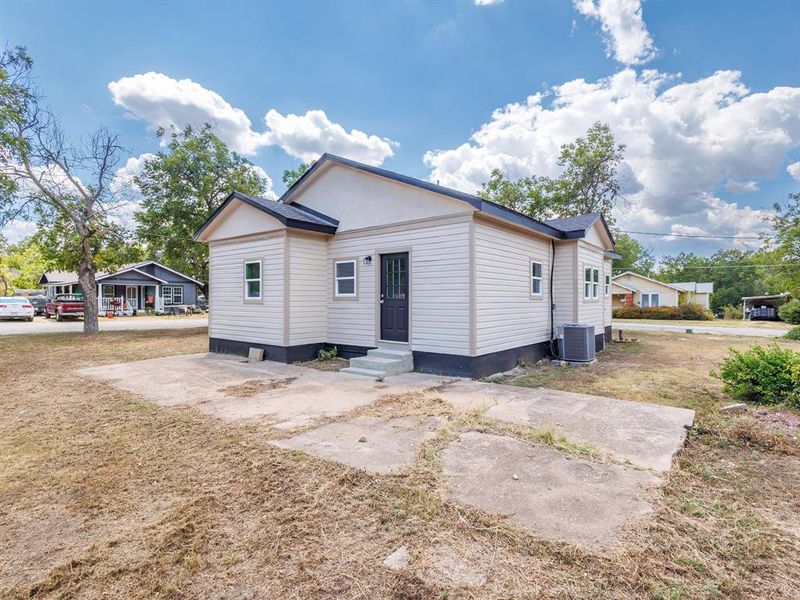 Front exterior of a new home in , Coleman, TX, highlighting curb appeal (Image 1). Front exterior of a new home in , Coleman, TX, highlighting curb appeal (Image 1).
