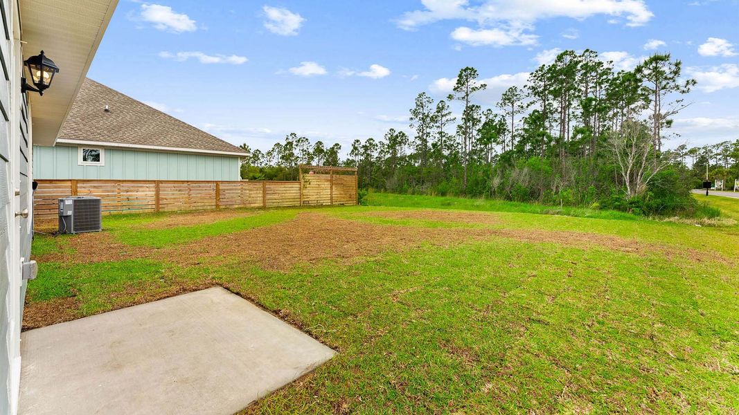 Exterior details and patio area of a home in Palmetto Bluff, Port Saint Joe (Image 3).