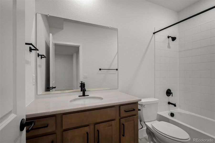 Furnished interior view inside a new home in Revel Crossing at Wolf Ranch – The Outlook Collection, Colorado Springs (Image 14).