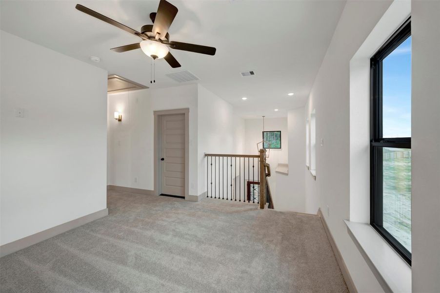 Spacious, unfurnished interior of a new home in The Highlands 40', Porter (Image 27).