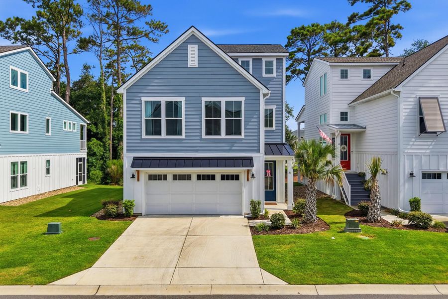 Front exterior of a new home in , North Myrtle Beach, SC, highlighting curb appeal (Image 25). Front exterior of a new home in , North Myrtle Beach, SC, highlighting curb appeal (Image 25).