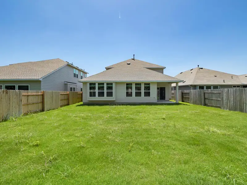 Exterior details and patio area of a home in Orchard Ridge, Liberty Hill (Image 4).