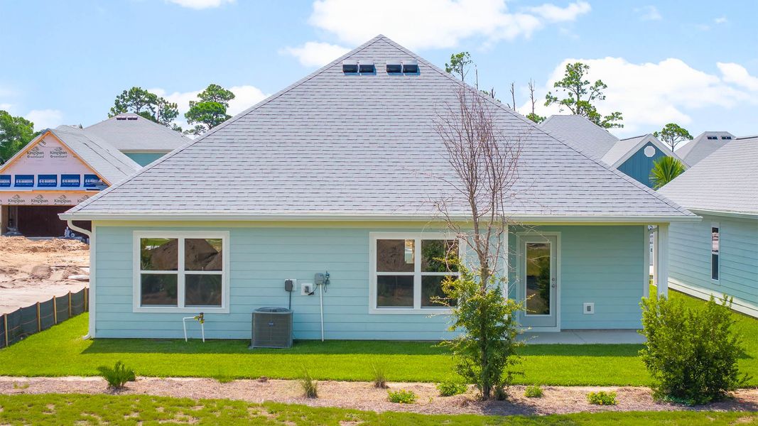 Front exterior of a new home in Windmark Beach, Port Saint Joe, FL, highlighting curb appeal (Image 17).