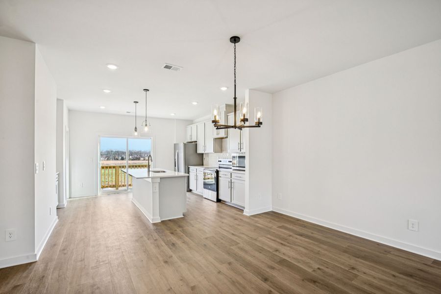 Furnished interior view inside a new home in Greystone - Highland Townhomes, Smyrna (Image 5).