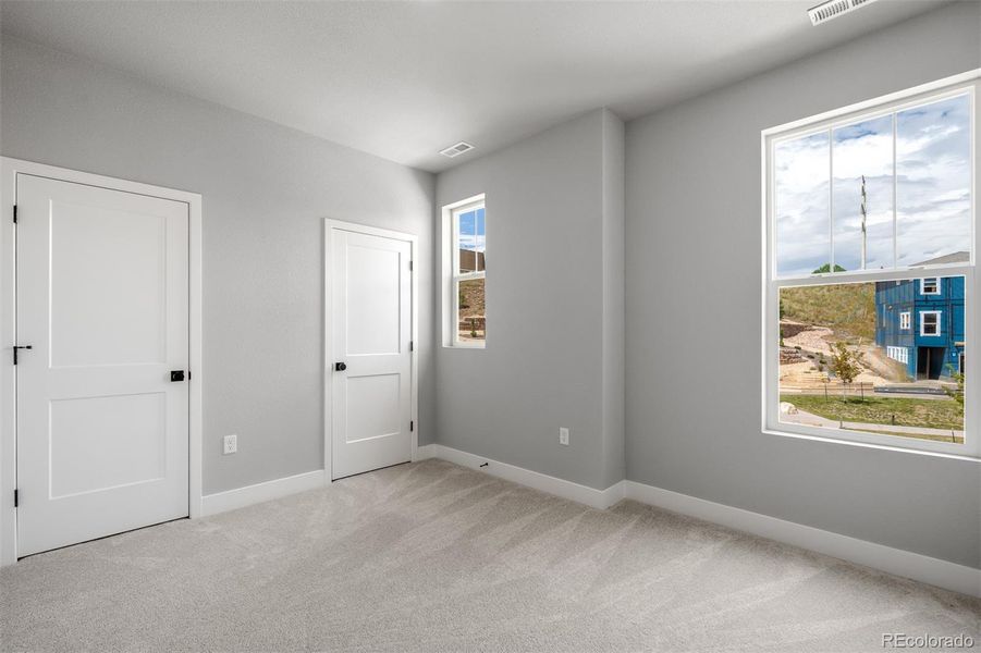 Spacious, unfurnished interior of a new home in Trailside at Cottonwood Creek, Colorado Springs (Image 28).