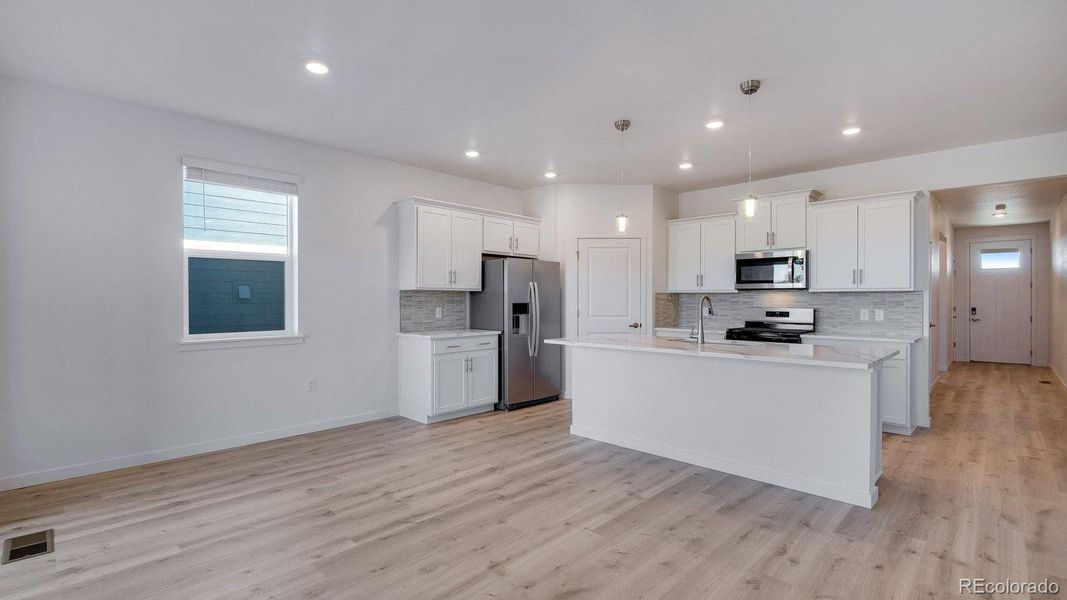 Furnished interior view inside a new home in Trails at Crowfoot, Parker (Image 13).