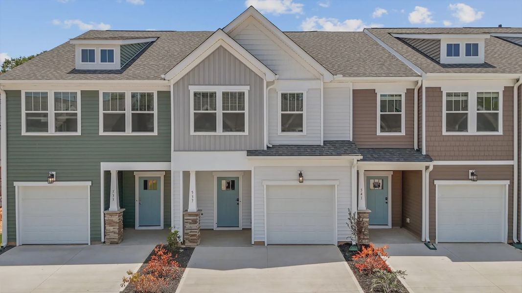 Front exterior of a new home in Saluda Crossing, Piedmont, SC, highlighting curb appeal (Image 1).