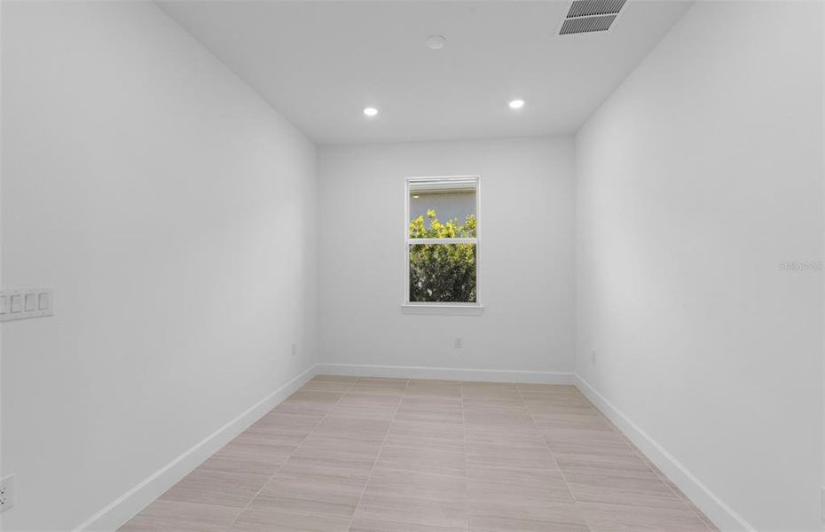 Spacious, unfurnished interior of a new home in BeachWalk by Manasota Key, Englewood (Image 18). Spacious, unfurnished interior of a new home in BeachWalk by Manasota Key, Englewood (Image 18).