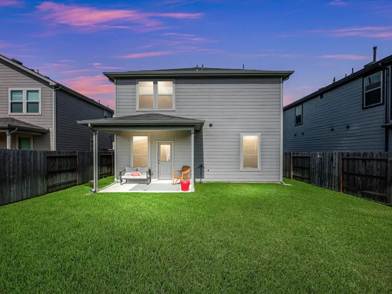 Exterior details and patio area of a home in Mavera, Conroe (Image 20).