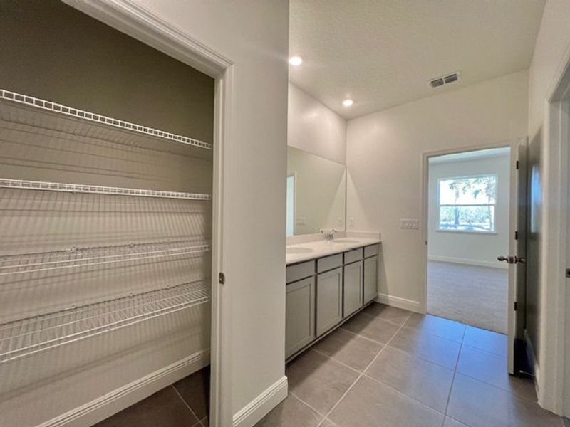 Furnished interior view inside a new home in Lakes At St Sebastian, Micco (Image 12).