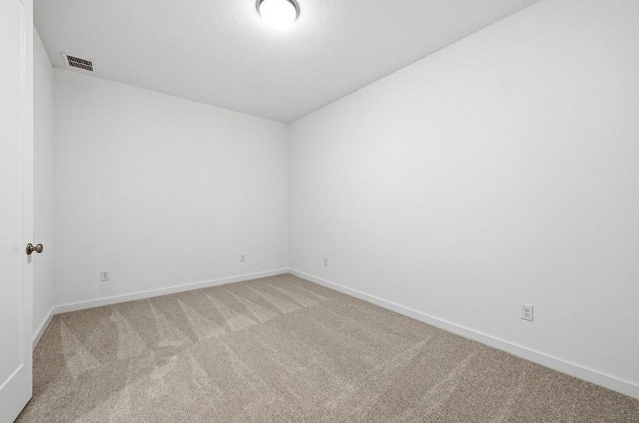 Spacious, unfurnished interior of a new home in 6 Creeks at Waterridge, Kyle (Image 18).