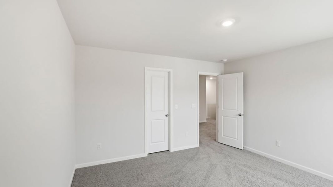 Spacious, unfurnished interior of a new home in Waverly Station, Greenwood (Image 27).
