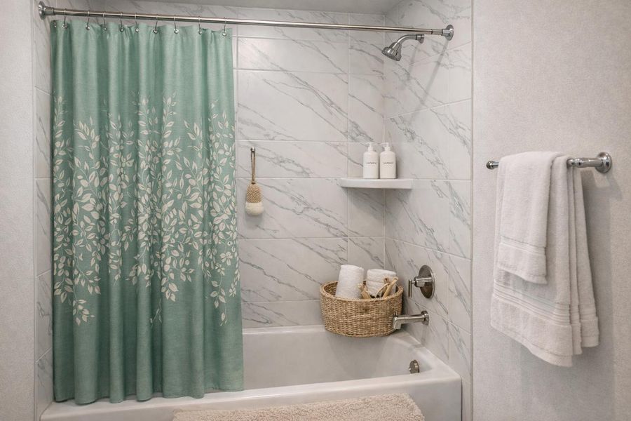 Escape to relaxation in this beautifully staged upstairs bathroom.