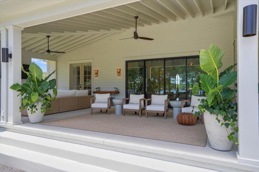 Exterior details and patio area of a home in , Wadmalaw Island (Image 32).
