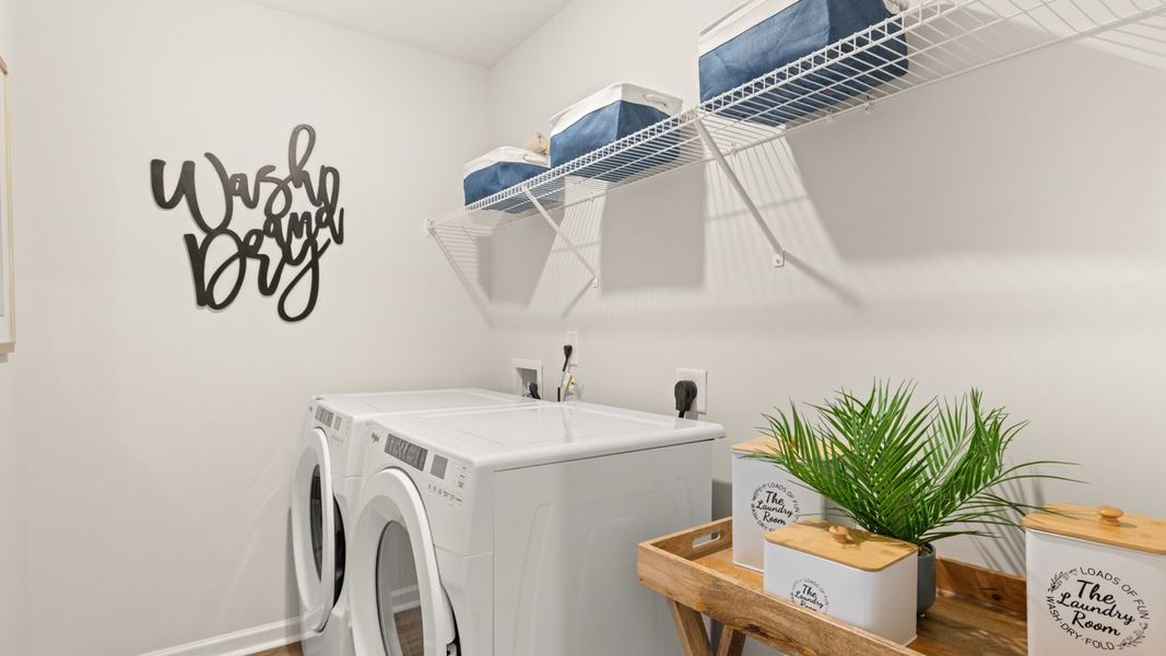 Representative furnished interior of a home built from the Iria Glen by D.R. Horton in Brookland Commons, Monroe (Image 52).