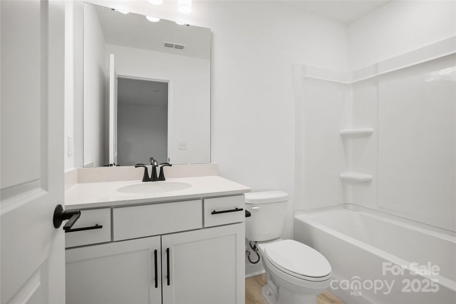 Furnished interior view inside a new home in Forest Creek, Waxhaw (Image 12).