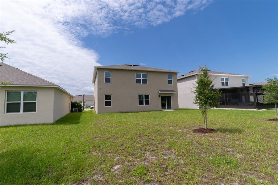 Exterior details and patio area of a home in , Harmony (Image 33).