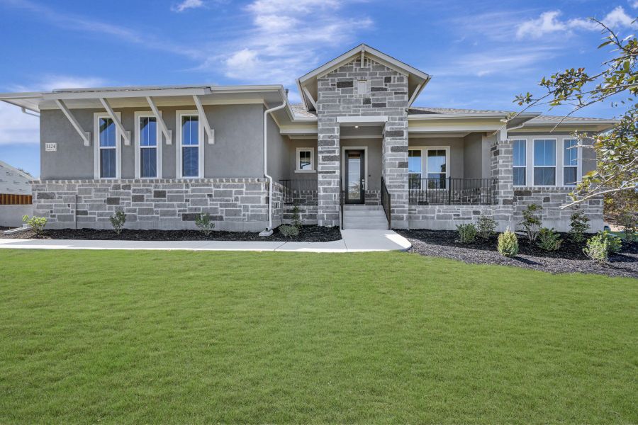 Front exterior of a new home in Thornebrook, Bulverde, TX, highlighting curb appeal (Image 17).