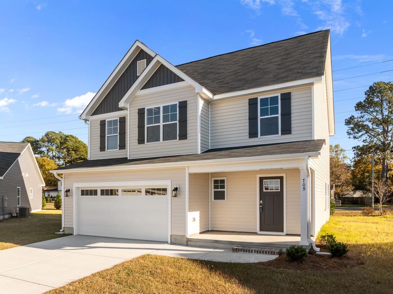 Front exterior of a new home in Arbor Hills South, Greenville, NC, highlighting curb appeal (Image 20). Front exterior of a new home in Arbor Hills South, Greenville, NC, highlighting curb appeal (Image 20).