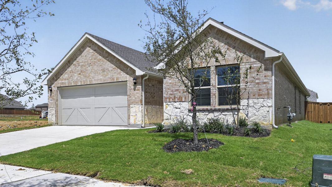 Representative exterior photo of a completed home built from the H158 Canyon by D.R. Horton in Lilybrooke at Legacy Hills, Celina, TX (Image 2). Representative exterior photo of a completed home built from the H158 Canyon by D.R. Horton in Lilybrooke at Legacy Hills, Celina, TX (Image 2).