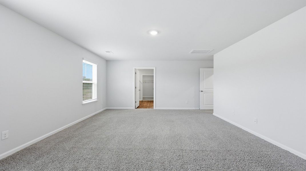 Spacious, unfurnished interior of a new home in Pine Hills at Cane Bay, Summerville (Image 13). Spacious, unfurnished interior of a new home in Pine Hills at Cane Bay, Summerville (Image 13).