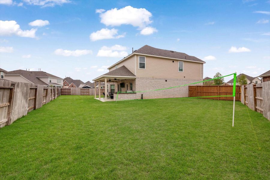 Front exterior of a new home in Marvida, Cypress, TX, highlighting curb appeal (Image 27).