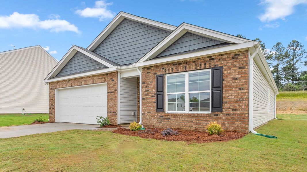 Front exterior of a new home in Sherwood Estates, Yadkinville, NC, highlighting curb appeal (Image 15).