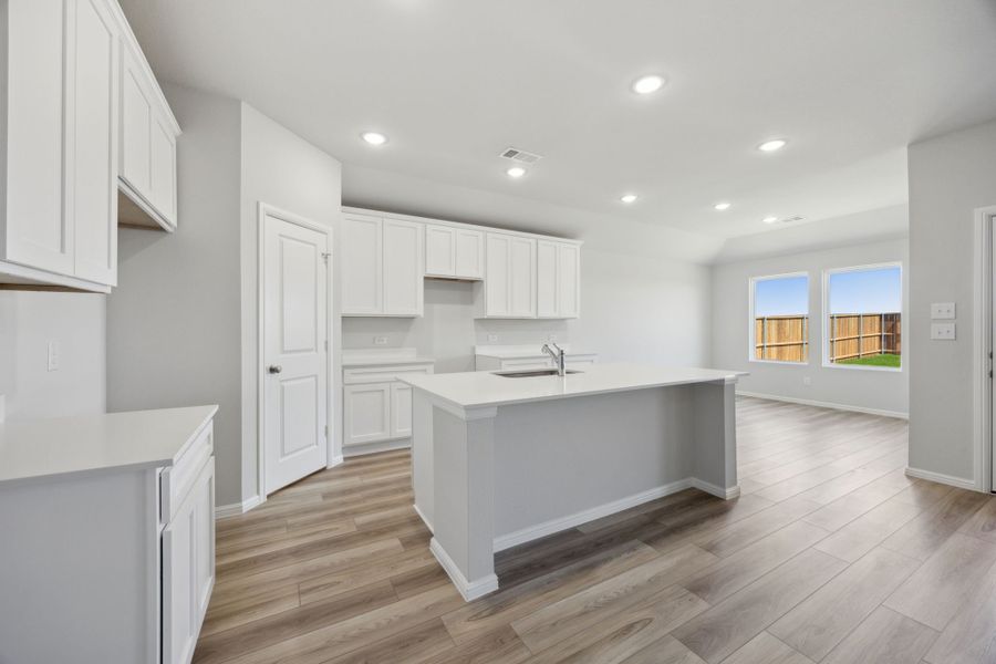 Representative furnished interior of a home built from the Isla II by Megatel Homes in Venetian, Celina (Image 3).