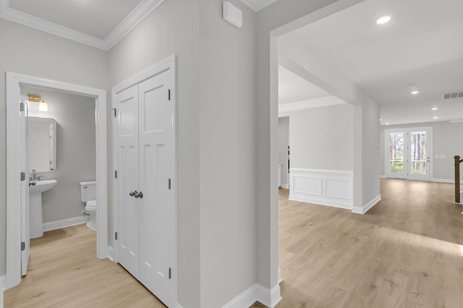 Spacious, unfurnished interior of a new home in Tidewater at Lakes of Cane Bay, Summerville (Image 21).