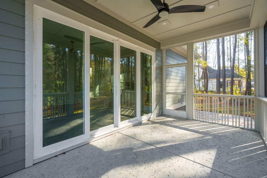 Exterior details and patio area of a home in , Awendaw (Image 38).