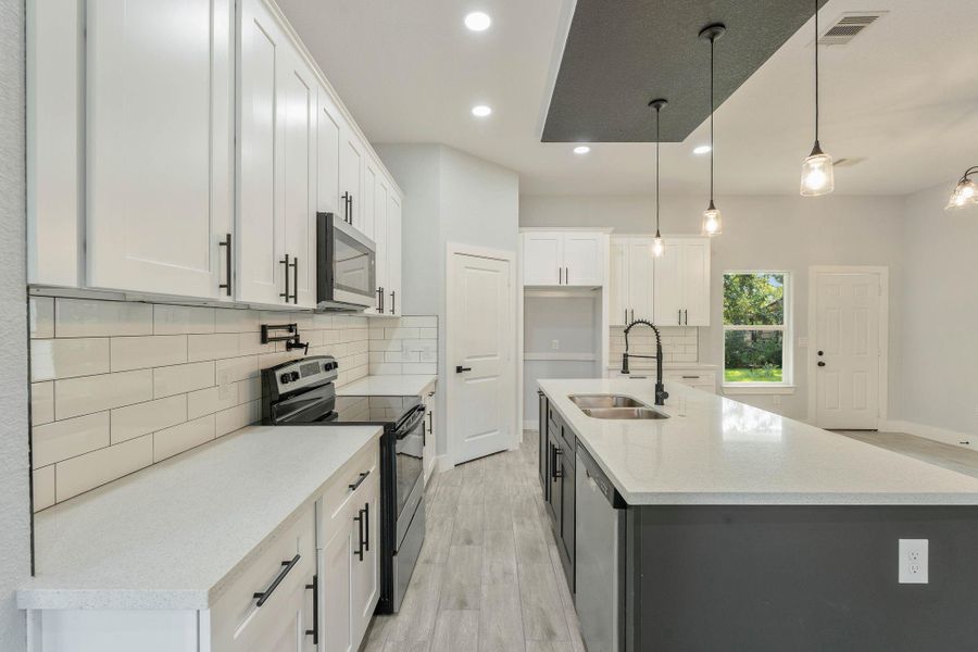 Furnished interior view inside a new home in , Willis (Image 6). Furnished interior view inside a new home in , Willis (Image 6).