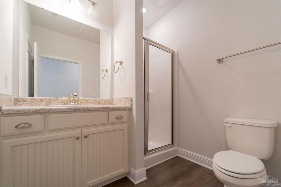 Furnished interior in a model home at Muldoon Pointe in Pensacola (Image 13).